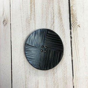 Botón con textura negro y azul
