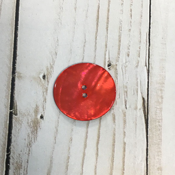 Botón nacarado rojo