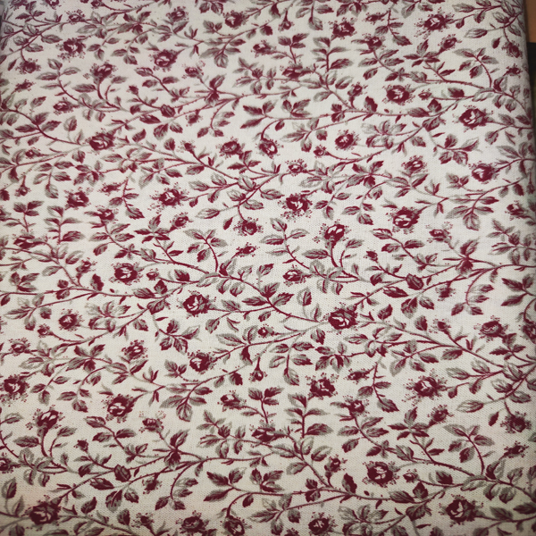 tejido estampado de rosas